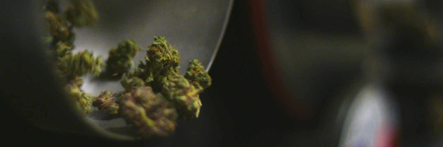 marijuana flower being poured out of a bowl